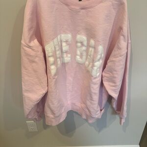 Pink Sweatshirt with White Lettering
